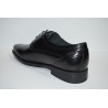 LUISETTI: Zapato de cabretilla negro piso de goma.